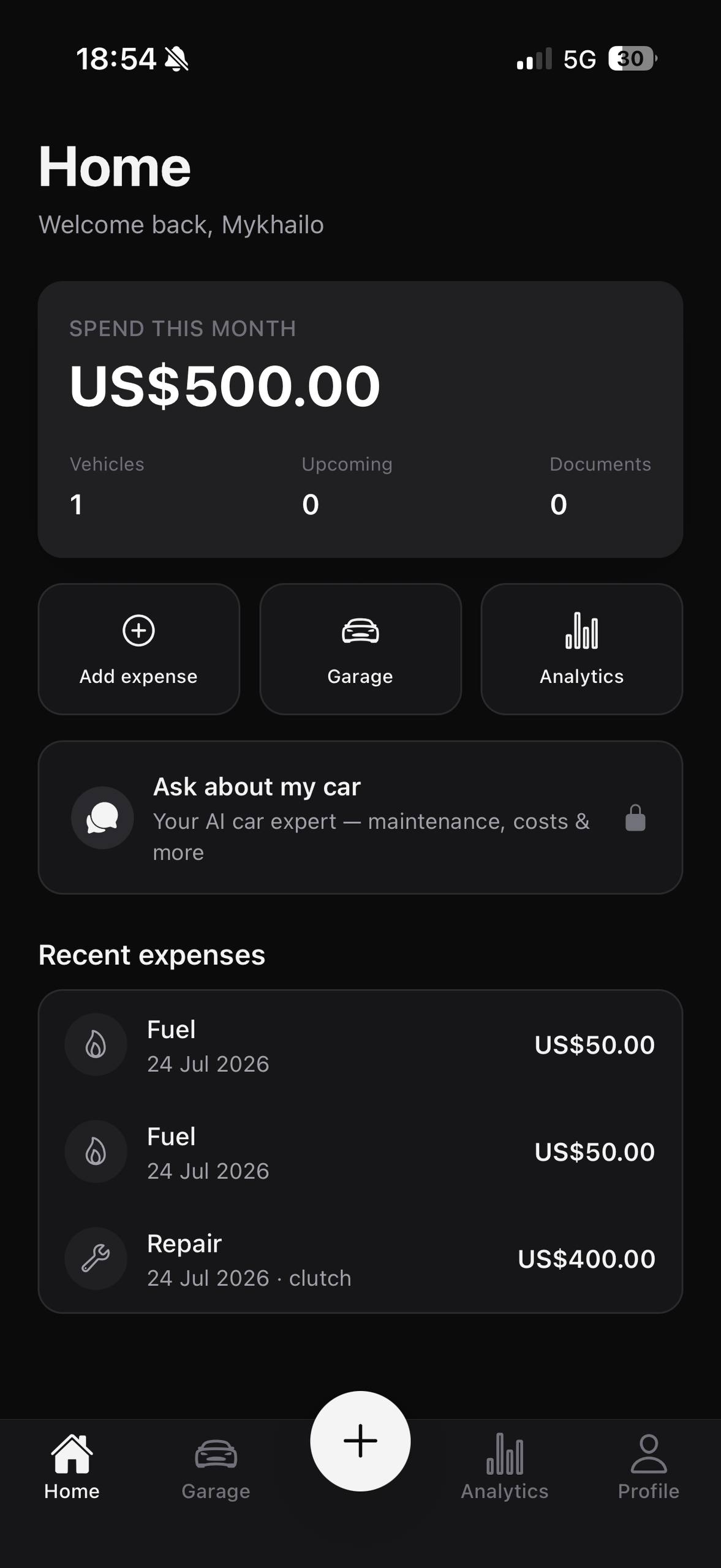 MotionQ app — Home screen showing monthly spend and recent expenses